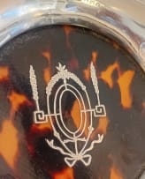 A George V silver mounted and tortoiseshell coasters, C&A makers mark, London 1919