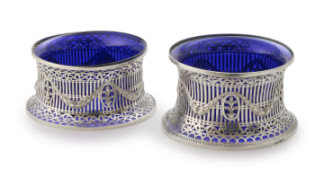 A near pair of Edward VII Irish silver dish rings, Charles Lambe, Dublin, 1909, 1911