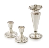 A Victorian silver vase, James Deakin & Sons, Chester, 1899; and a pair of Elizabeth II silver candlesticks, Sanders & Mackenzie, Birmingham, 1973