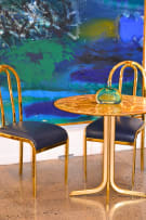 Marble top bistro table and two chairs