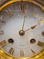 French gilt-metal and onyx figural mantel clock, late 19th century