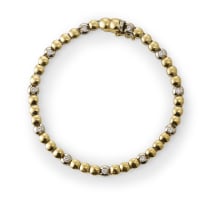 Gold bead tennis style bracelet