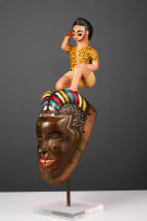 Guro mask with kneeling figure, Ivory Coast