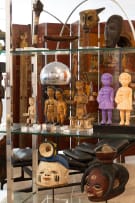 Ewe seated shrine figure with open palms, Ghana