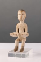 Ewe seated shrine figure with open hands, Ghana