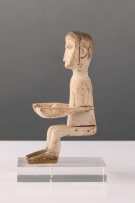 Ewe seated shrine figure with open hands, Ghana