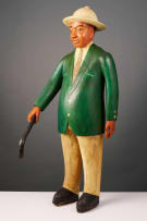 Colon standing figure in suit, West Africa