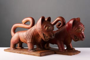Ashanti male and female lion bookends, Ghana, two