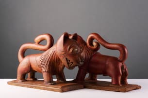 Ashanti male and female lion bookends, Ghana, two
