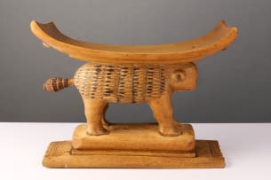 Ashante stool with tiger emblem, Ghana
