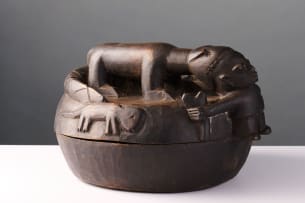 Yoruba divination bowl with crocodile devouring a man, Nigeria