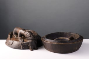 Yoruba divination bowl with crocodile devouring a man, Nigeria