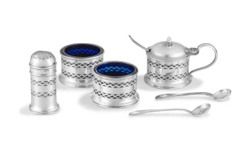 A George V silver mustard pot, two salts and a pepper pot, William Suckling Ltd, Birmingham, 1933