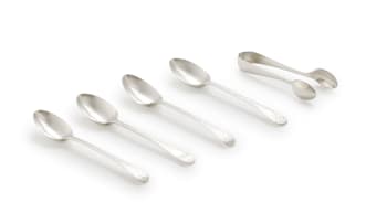 A miscellaneous set of George III silver teaspoons and tongs, William Eley I & William Fern, 1815