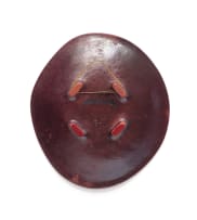 Kalahari Studio; Organic-shaped plate with figural motif wearing skirt and headdress