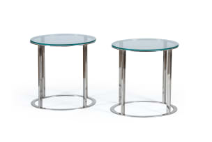 Pair of circular chrome and glass side tables