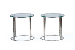 Pair of circular chrome and glass side tables