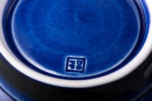 David Schlapobersky and Felicity Potter; Set of blue lidded vessels with floral motifs, three