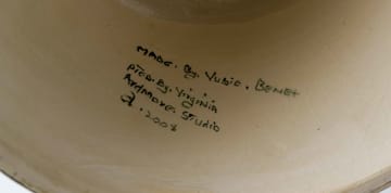 Ardmore Ceramic Studio; Lidded vessel with winged figures and flowers