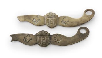 Two VOC musket side escutcheon plates, Amsterdam, c.1700-1743