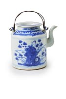 A Chinese teapot, late 19th century and a blue and white dish, 18th century, depicting Guanyin in the hall of the hundred children