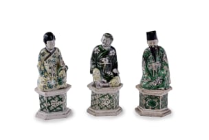 A group of three Chinese porcelain figures depicting Taoist immortals, Kangxi period, 1662-1722