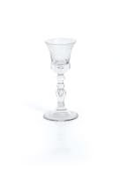 A glass goblet bearing the VOC monogram, mid-18th century