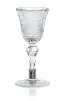 A glass goblet with rococo-engraved maritime scenes and VOC motifs, mid-18th century