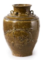 A Southeast Asian brown-glazed stoneware Martaban storage jar with applied dragon decoration
