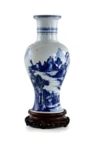 A Chinese porcelain vase on wooden stand, Kangxi period, 1662-1722