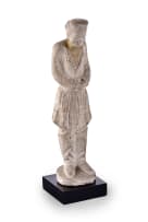 An early Chinese pottery figure of a tomb attendant, T'ang dynasty, 618 - 906