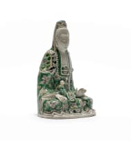 A Chinese famille verte biscuit porcelain figure of Guanyin in Kangxi period, 1662-1722