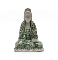 A Chinese famille verte biscuit porcelain figure of Guanyin in Kangxi period, 1662-1722