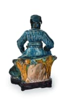 A Chinese stoneware tilemakers figure of Guandi, Ming dynasty, 16th to 17th century