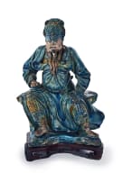 A Chinese stoneware tilemakers figure of Guandi, Ming dynasty, 16th to 17th century