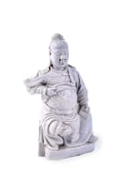 A Chinese Dehua figure of a Guandi, Qing Dynasty, 17th or 18th century
