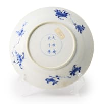 A pair of Chinese blue and white porcelain saucer dishes, Kangxi period, 1662-1722