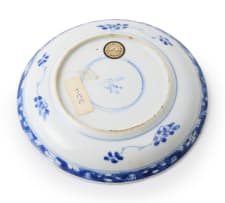 A pair of Chinese blue and white porcelain cups and saucers, Kangxi period, 1662-1722