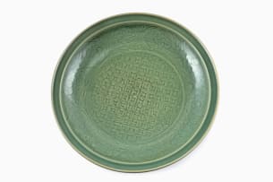 A large Chinese Longquan celadon charger, late Ming dynasty, 1368-1644