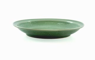 A large Chinese Longquan celadon charger, late Ming dynasty, 1368-1644