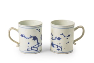 A pair of Chinese export porcelain mugs from the Nanking Cargo, c. 1750