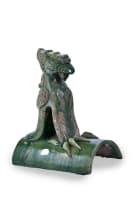 A Chinese ceramic ridge tile modelled as a stylised phoenix, Ming/Qing dynasty, 1368–1912