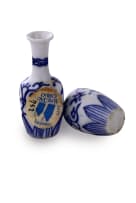 A pair of blue and white porcelain doll house vases