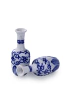 A pair of blue and white porcelain doll house vases