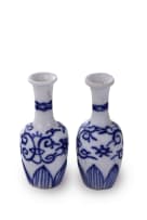 A pair of blue and white porcelain doll house vases