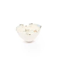 Various Artists; Wooden cabinet with glass shelves and fluorescent lights with 24 ceramic art pieces