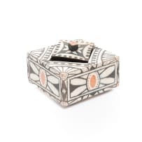 Various Artists; Wooden cabinet with glass shelves and fluorescent lights with 24 ceramic art pieces