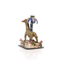 Ardmore Ceramic Studio; Pair of candle sticks with giraffe, palm tree and flower motifs, two