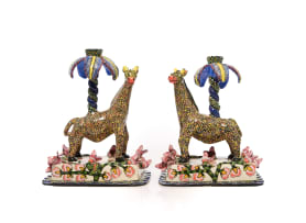 Ardmore Ceramic Studio; Pair of candle sticks with giraffe, palm tree and flower motifs, two