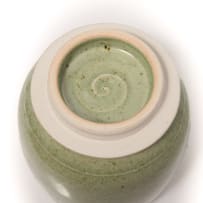 Peter Jaff; Celadon lidded jar with relief linear motif